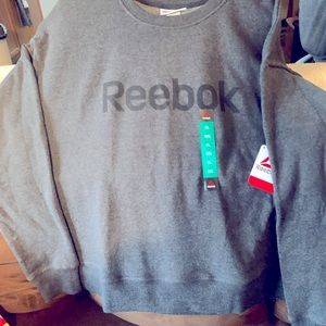 Brand new crew neck Reebok sweatshirt unisex size XL.